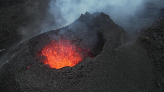 Drone video of an active volcano that is erupting