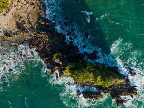 Aerial Photo of Karang Agung Rocky Beach at Sunset, Beautiful Coastal Texture from Above, UNESCO Global Geopark Kebumen