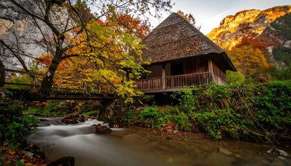 Autumnal cabin nestled beside a stream