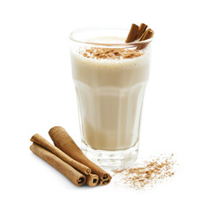 A glass of milk with cinnamon sticks and cinnamon powder on a white background.