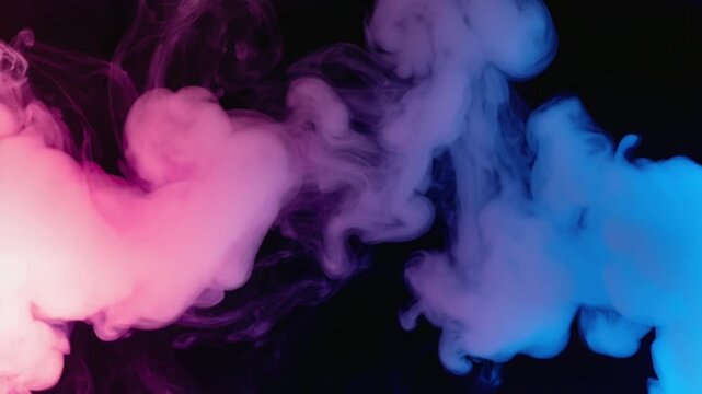 Abstract blue and pink smoke, fog, steam clouds over black background for gender reveal