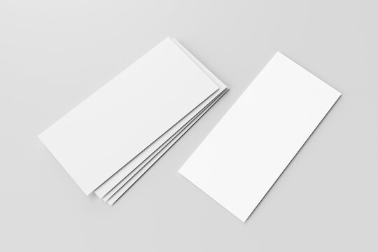 Stack of blank white DL flyers or brochures and one separate one on the right side for mockup isolated on light grey background