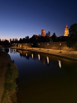 Gyor, Hungary at night, river reflection