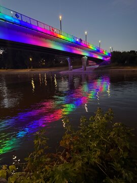 Rainbow Bridge at Night with Reflection