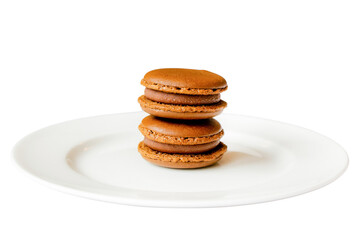 Macarons Delight: A close-up showcases a tower of delectable, chocolate-flavored macarons, nestled...