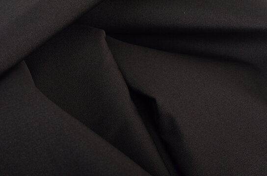 JAKARTA, INDONESIA - JANUARY 6, 2026: A macro shot of black ripstop material used in the manufacturing of heavy-duty tactical equipment.