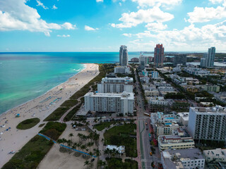 Miami under the summer sky with clouds. South beach coastal in Miami. Skyscrapers in Miami, aerial...