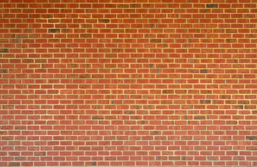 Brick wall made with bricks. Old red brick wall, masonry wall, stonework. Bric kwall background texture. Textured background of brickwall. Clinker brick.