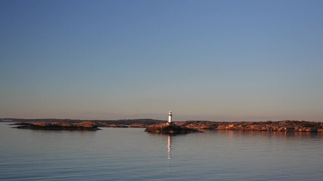 Ursholmen Lighthouse golden hour Arctic sunlight sunset ferry boat ride Scandinavia islands Ytre Hvaler National Park Str&ouml;mstad Stromstad Oslo Fjord Sweden Sverige Norway Norge parallax right motion
