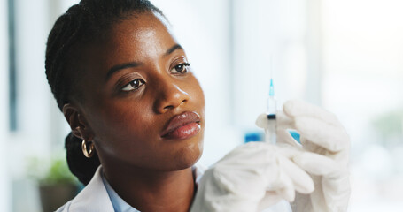 Syringe, doctor and black woman in hospital for vaccine, virus prevention and immune protection....