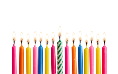 Celebrate with vibrant, colorful birthday candles casting a warm, inviting glow for joyous occasions