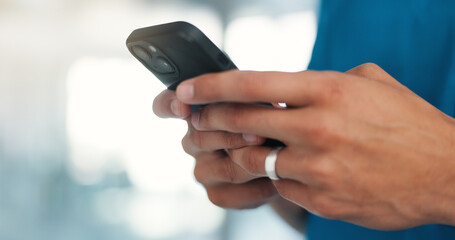 Hands, phone and texting in hospital, hallway and chat on web, notification and contact at...