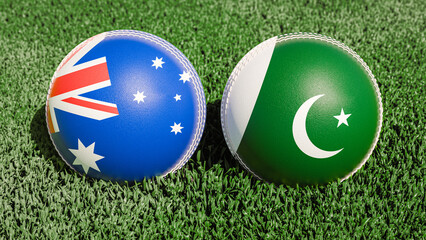Two cricket balls featuring the flags of Australia and Pakistan, on a grassy field