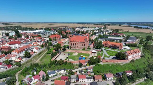  Aerial Gniew Poland Vistula River historic castle circle 2. Northern Poland. Castle construction 13th century by Teutonic Knights. Vistula River. Agriculture land, river, forest and farm rural area.