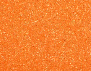 Vibrant orange glitter and sand texture provides a sparkling, festive background.