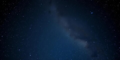 Naklejka premium Vast, inky sky brimming with countless stars, Milky Way visible, stargazing, nocturnal