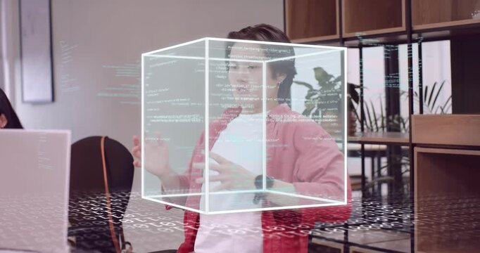 coder stretching activating 3D code cube manipulating using smartwatch before resuming laptop work