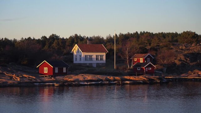 Sandefjord coastal seaside town tower marina red buildings Str&ouml;mstad Stromstad Sweden Sverige coastline OsloFjord Nakholmen Island inner Scandaniva sunset golden hour yacht sailboat ferry boat ride