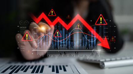 Economic caution visualized with fluctuating market graph, alert symbols, and negative data trends....
