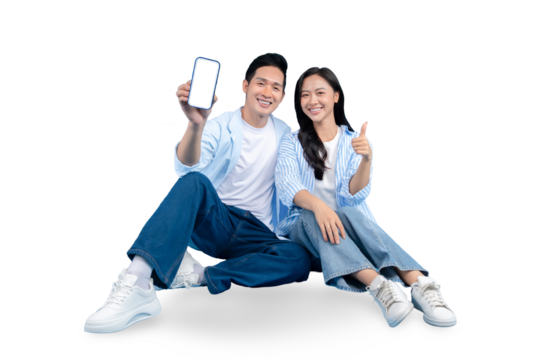 A couple holding a smartphone and smiling while doing a thumb up on PNG background