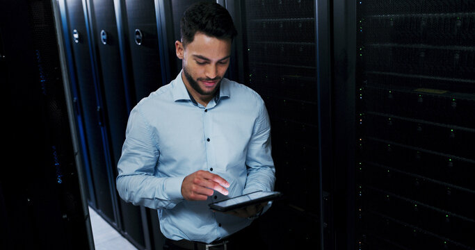 Man, tablet and typing for inspection in server room, smile and checklist for IT solution at company. Person, cybersecurity and system assessment with tech, app and information technology at agency - Powered by Adobe