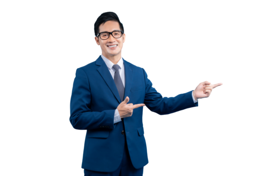  Asian businessman  in a blue suit is pointing to the side with both hands, smiling with a friendly face on PNG background - Powered by Adobe