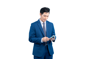  Asian businessman in a suit looking down at his smartphone. This image has clear focus and bright lighting on PNG background