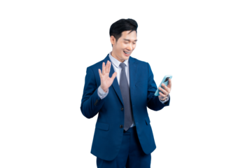 Asian businessman is cheerfully waving during a video call on his mobile phone. A smart businessman is in formal wear on PNG background
