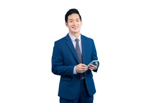 A smiling Asian businessman holding his phone on PNG background