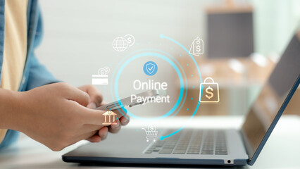 Close up of hands using smartphone with online payment secure interface. Concept of fintech, mobile banking, e-commerce, digital finance, cashless transaction, and cyber security in business.