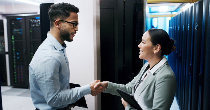 Administration, handshake and meeting with people in server room together for networking agreement. Data center, deal and partnership with cybersecurity team shaking hands for thank you or welcome
