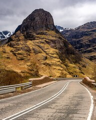 Scenic highway through Glencoe with The Three Sisters in early spring, Scotland