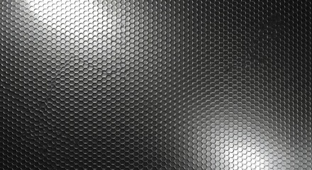 Textured metallic surface with reflective light patterns creating a modern abstract background