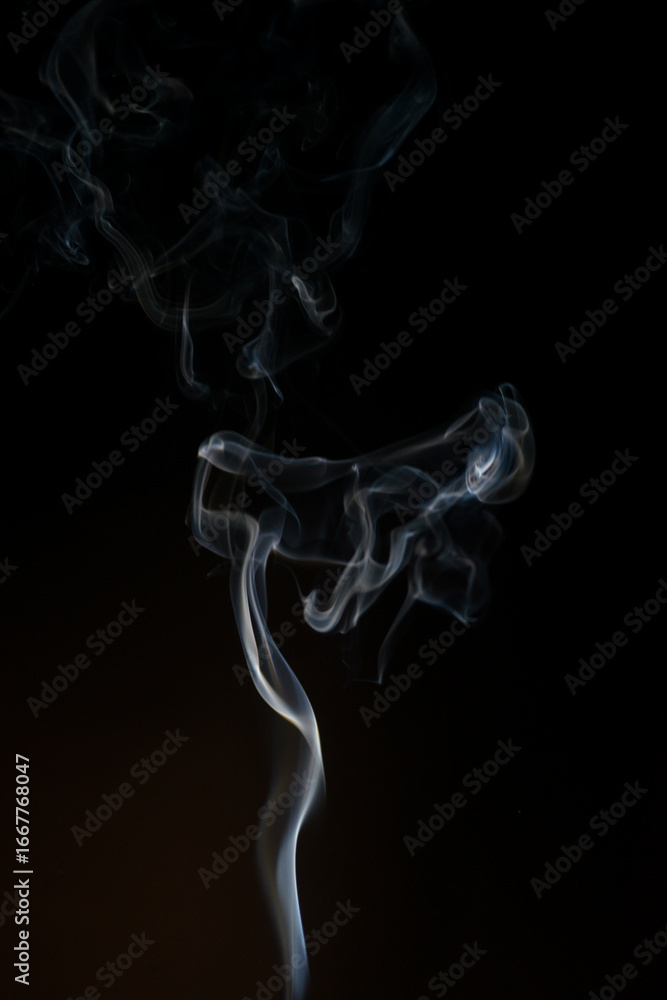 Poster whisps of transformation: an ethereal wisp of smoke dances gracefully against a stark backdrop, its 