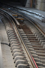 Close-up of railway tracks, metro station, tunnel

