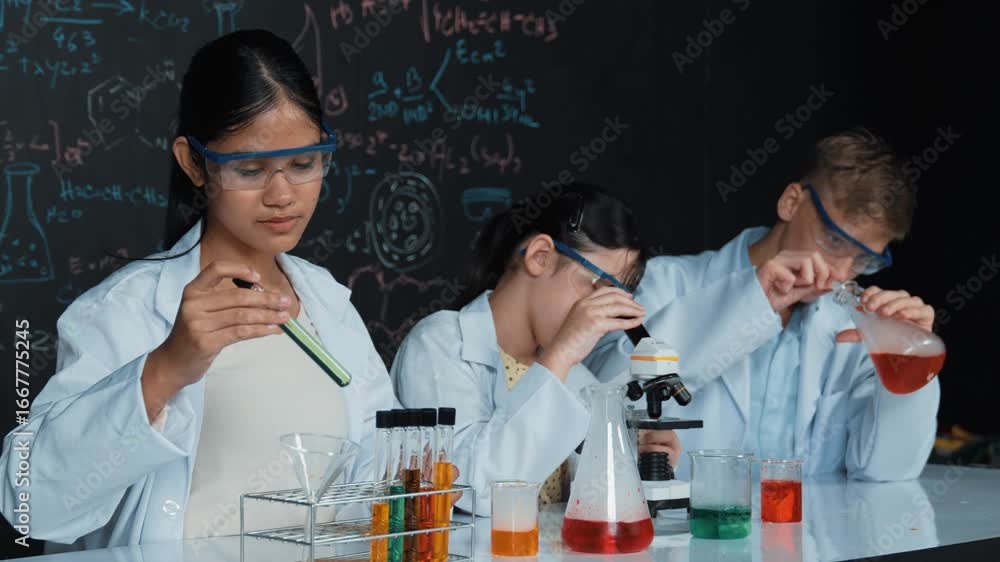 Poster cute girl looking under microscope while student doing experiment at blackboard with theory written.