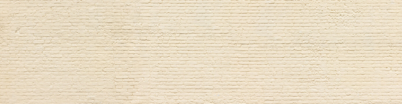 Old yellow brick wall background, wide panorama of masonry	