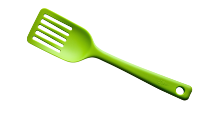 Green silicone kitchen spatula isolated on transparent background 
