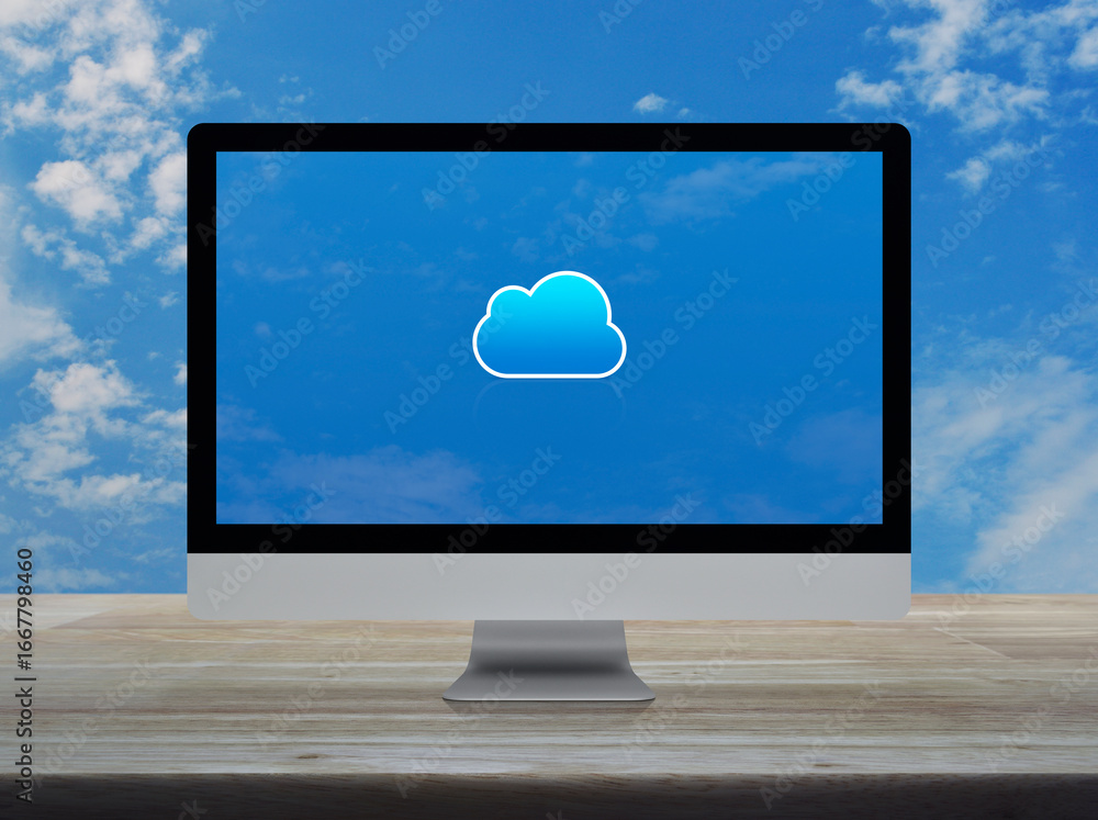 Aufkleber cloud computing flat icon on modern computer monitor screen on wooden table over blue sky with white