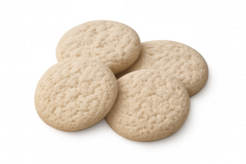 Soft, golden round cookies stacked slightly, delicate edges touching, resting on clean transparent surface