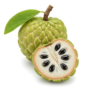 Close-up of a whole and halved cherimoya fruit with a leaf.