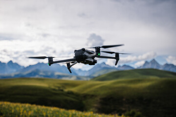 Flying drone in high altitude mountains