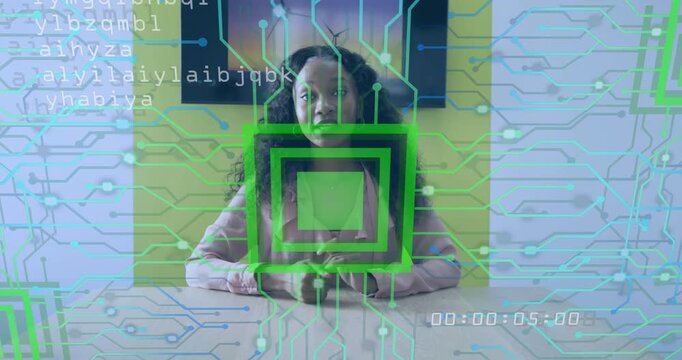 Woman sitting at table monitoring tech scan overlay cycling code and timestamp advancing