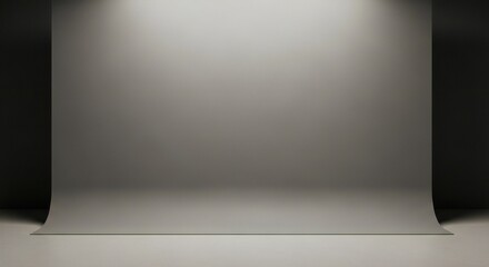 Empty studio backdrop with curved floor and dramatic lighting creates a modern, professional background for product photography or creative projects