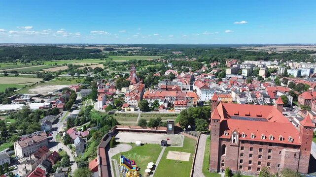 Aerial Gniew Poland Vistula River to castle 3. Northern Poland. Castle construction 13th century by Teutonic Knights. Vistula River. Agriculture land, river, forest and farm rural area.