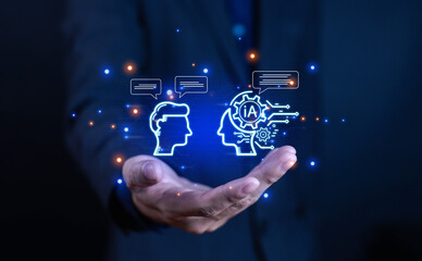 Businessman holding digital illustration of human-AI communication with chatbot interface....