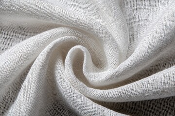 White linen fabric, draped in a spiral