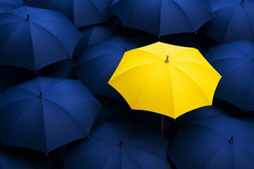 Bright yellow umbrella standing out among dark blue umbrellas on a seamless background, symbolizing individuality and uniqueness concept.