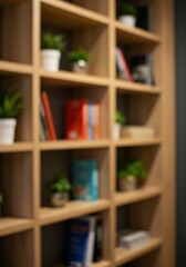 Softly blurred background of a modern bookshelf with books and plants, bokeh effect, warm and cozy.