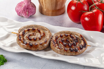 Grilled beef round circle sausages